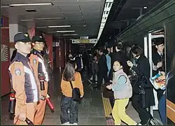 Seoul Fire Services personnel participating in a firefighting exercise on Seoul Subway Line 6 in March 2001
