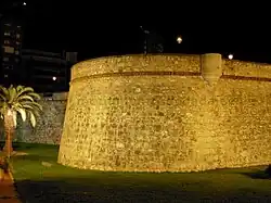 Night view of the orillon and bartizan at the western end