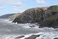 Looking towards Cemaes Head from Ceibwr Bay to the south. The contorted strata is evident.