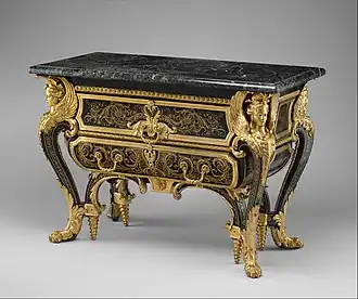 Baroque commode; by André Charles Boulle; c.1710-1732; walnut veneered with ebony and marquetry of engraved brass and tortoiseshell, gilt-bronze mounts, antique marble top; 87.6 x 128.3 x 62.9&nbsp;cm; Metropolitan Museum of Art (New York City)[58]