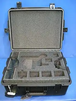 Plastic molded transit case with pre-cut foam interior