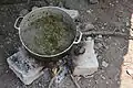 Ndolé prepared in a cooking pot
