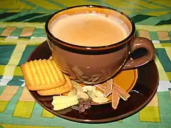 Northern India's most popular way to drink tea, masala chai, served with tea biscuits.