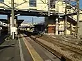 The footbridge linking the platforms. Note the elevator shafts.